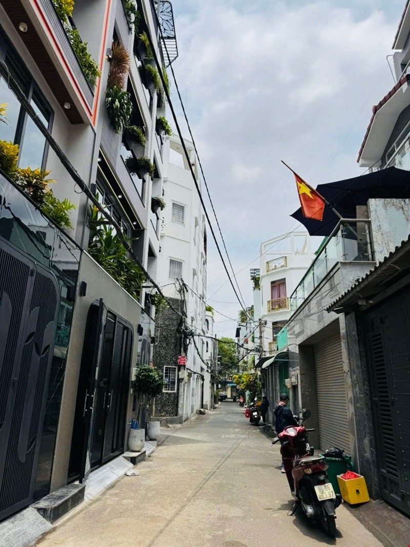 Bán nhà hẻm xe hơi sát MT Nguyễn Tư Giãn, 100M2, ngang 5m nở hậu đẹp, 8.6 tỷ TL.