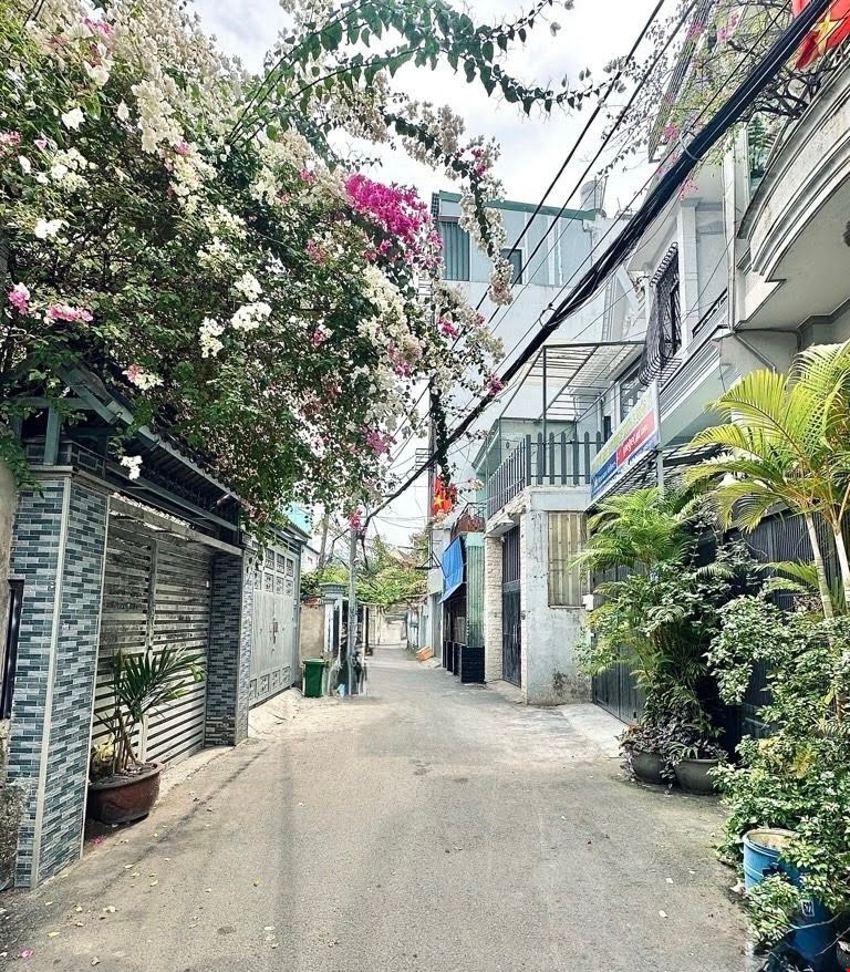 Bán nhà Gò Vấp, hẻm xe hơi Thống Nhất gần chợ Xóm Mới, 86M2, 3 tầng,khai thác 25tr/th, 6.3 tỷ tL