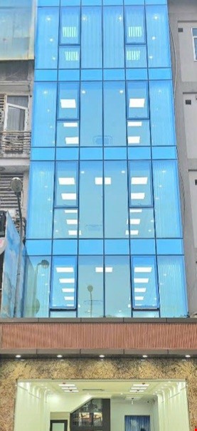 toa-nha-van-phong-6-tang-thang-may-gara-o-to-nguyen-hoang-cau-giay-2-thoang-truoc-sau-pr7667